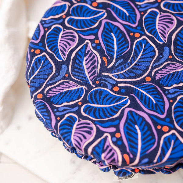 Blue and purple patterned fabric on a white background
