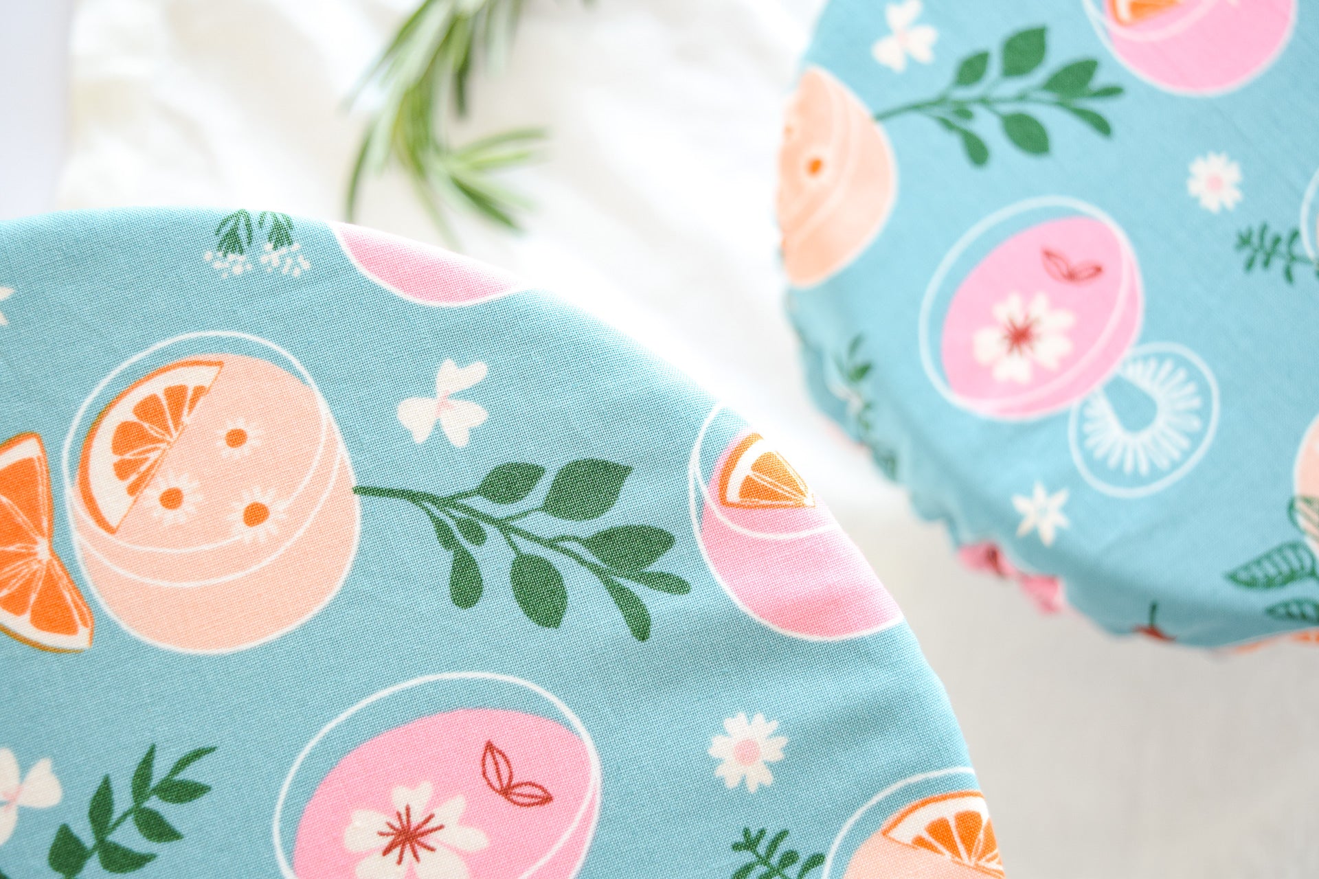 reusable dish cover closeup teal print with cocktails