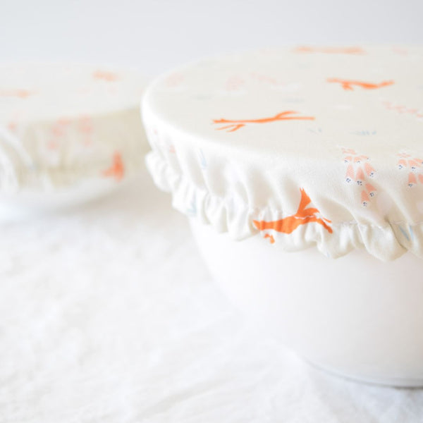 Reusable Dish Cover; cream with orange foxes and delicate floral print
