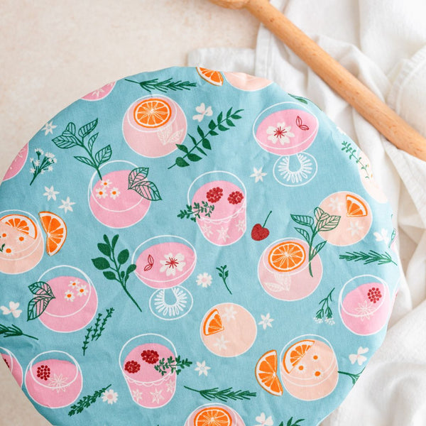 Reusable Dish Cover; turquoise with pink and orange cocktails print