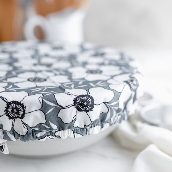 Grey floral dish cover close up photo